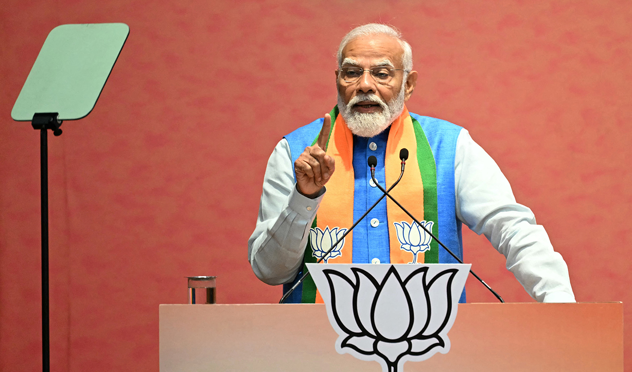 India's Prime Minister Narendra Modi speaks after releasing the Bharatiya Janata Party's (BJP) manifesto ahead of country's upcoming general elections, at the party headquarters in New Delhi on April 14, 2024. (AFP)