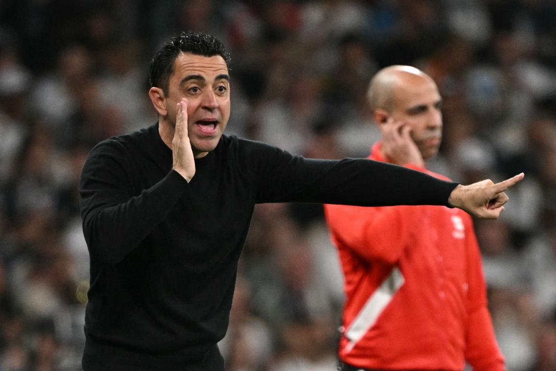 Barcelona’s Spanish coach Xavi gestures on the touchline during their Spanish league match against Real Madrid at the Santiago Bernabeu stadium in Madrid on Apr. 21, 2024. (AFP)