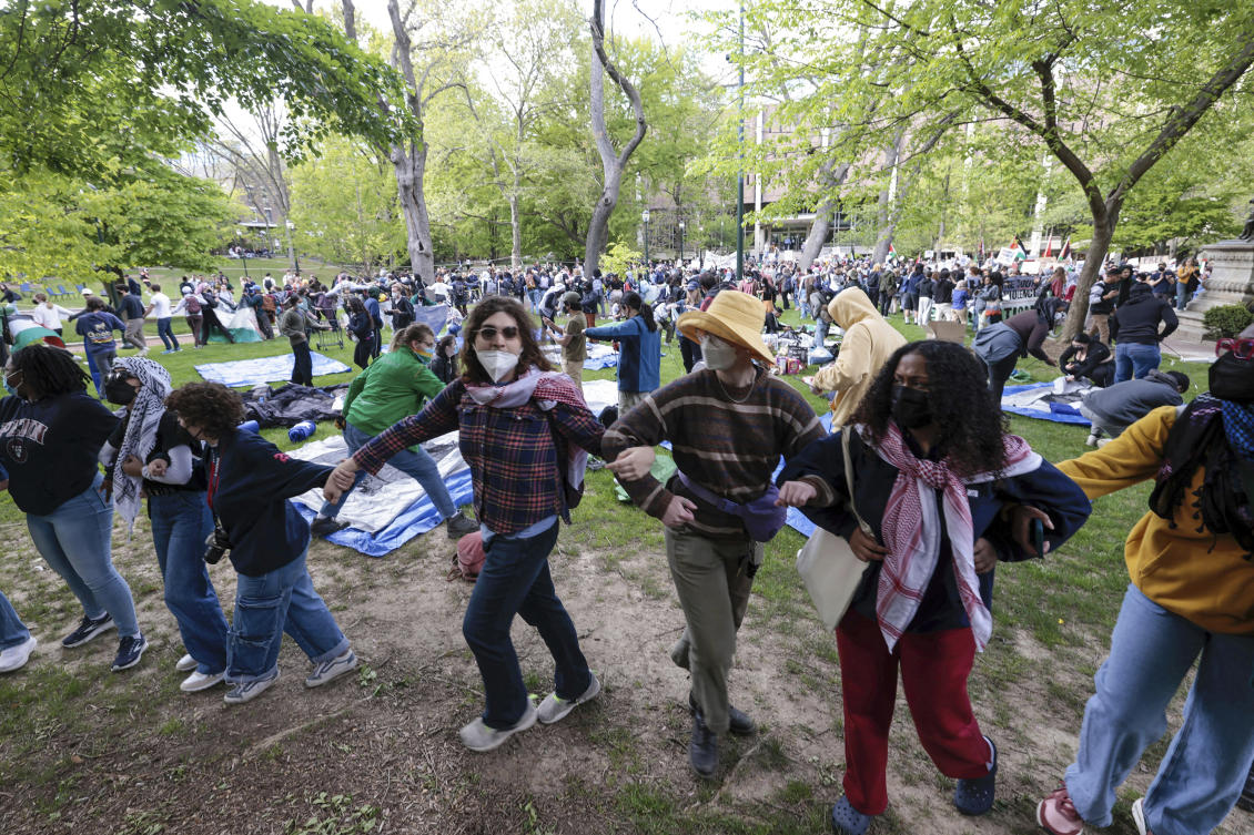 People lock arms during a Pro-Palestinian protest on Penn’s campus in Philadelphia on Apr. 25, 2024. (AP)