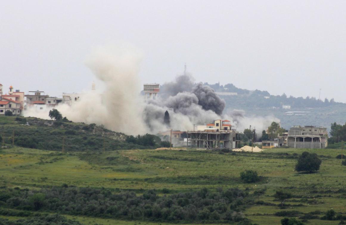 Smoke billows from the site of an Israeli airstrike on the southern Lebanese village of Tayr Harfa near the border on Apr. 26, 2024. (AFP)