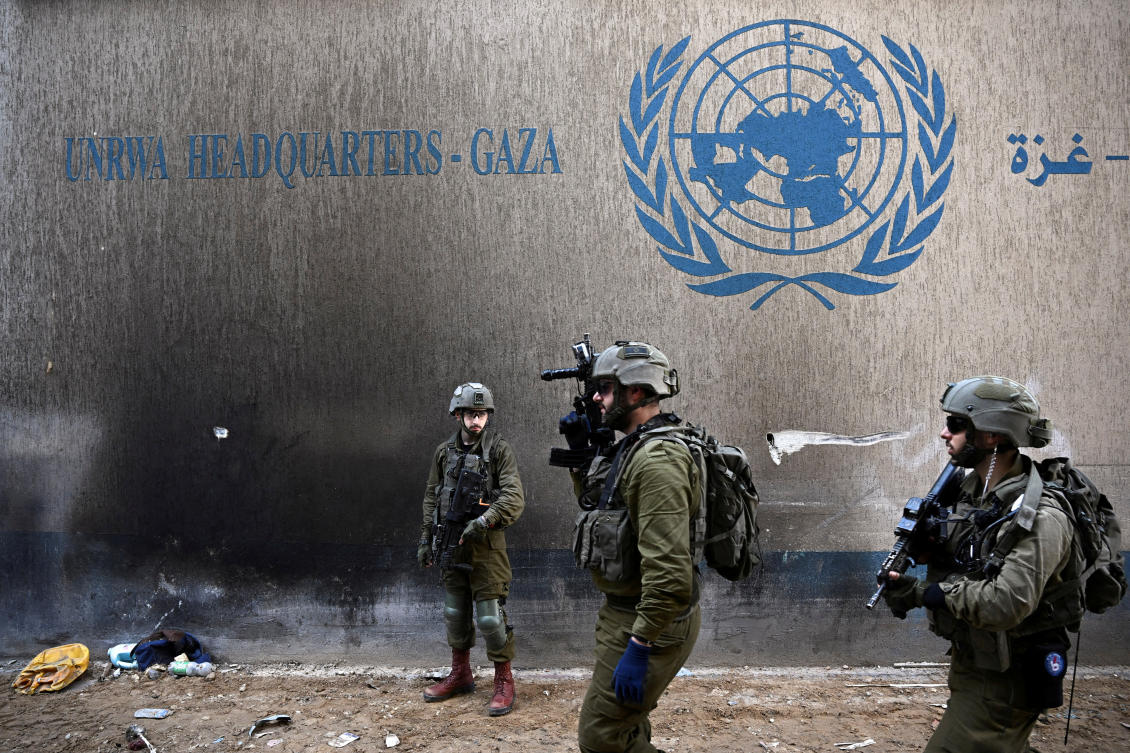Israeli soldiers operate next to the UNRWA headquarters in the Gaza Strip, on Feb. 8, 2024. (Reuters/File)