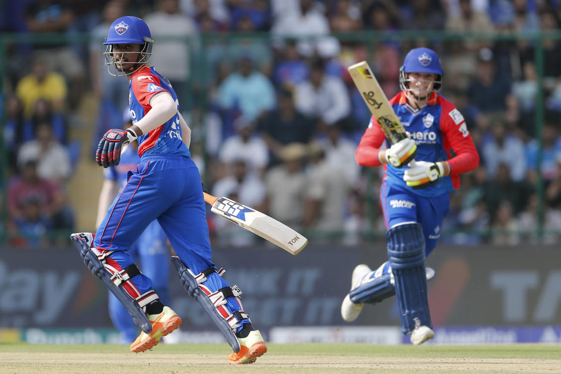 Delhi Capitals’ Abishek Porel, left, and Jake Fraser-McGurk, right, runs between the wickets during the IPL match between Delhi Capitals and Mumbai Indians in New Delhi. (AP)