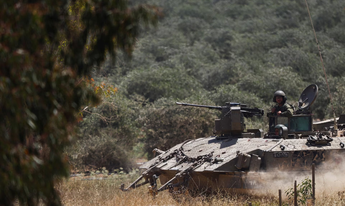 Israeli soldiers sit in a military vehicle near Israel's border with Gaza, amid the ongoing conflict between Israel and the Palestinian Islamist group Hamas, in Israel, April 17, 2024. (Reuters)