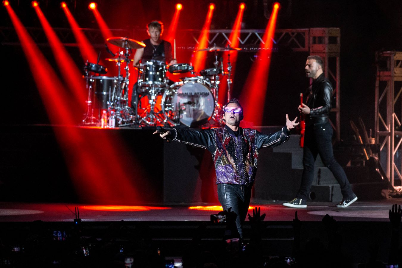 British rock veterans Muse are headed to Abu Dhabi for the second time as they get ready to perform at the 2024 Etihad Airways Abu Dhabi Grand Prix after-party concert series. (AFP)