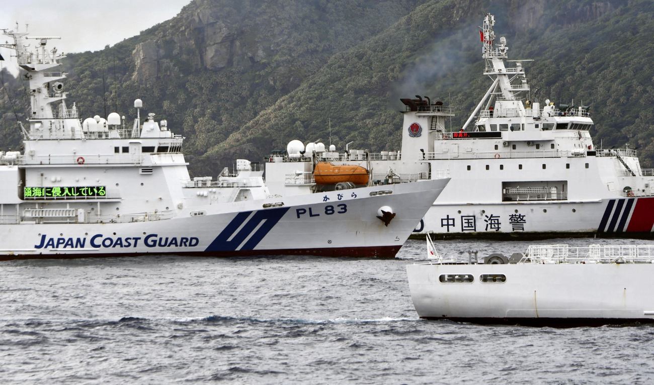 A China Coast Guard vessel sails near a Japan Coast Guard vessel Kabira off Uotsuri Island, one of a group of disputed islands called Senkaku Islands, also known in China as Diaoyu Islands, in the East China Sea April 27, 2024. (Reuters)