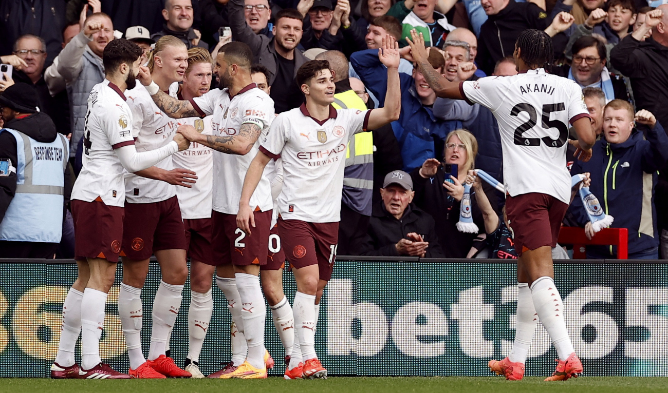 Manchester City's Erling Haaland celebrates scoring their second goal with teammates on April 28, 2024. (Reuters)