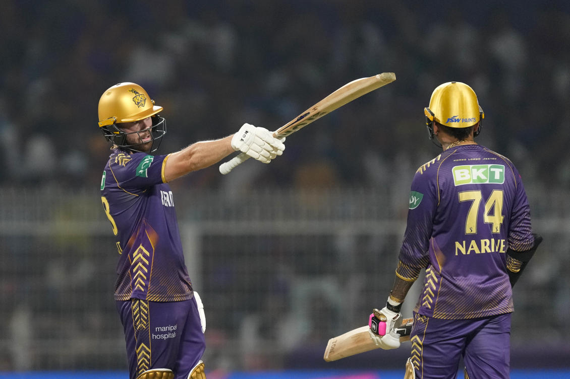 Kolkata Knight Riders’ Phil Salt, left, celebrates scoring fifty runs during the IPL cricket match between Delhi Capitals and Kolkata Knight Riders in Kolkata, India, Monday, April 29, 2024. (AP Photo)