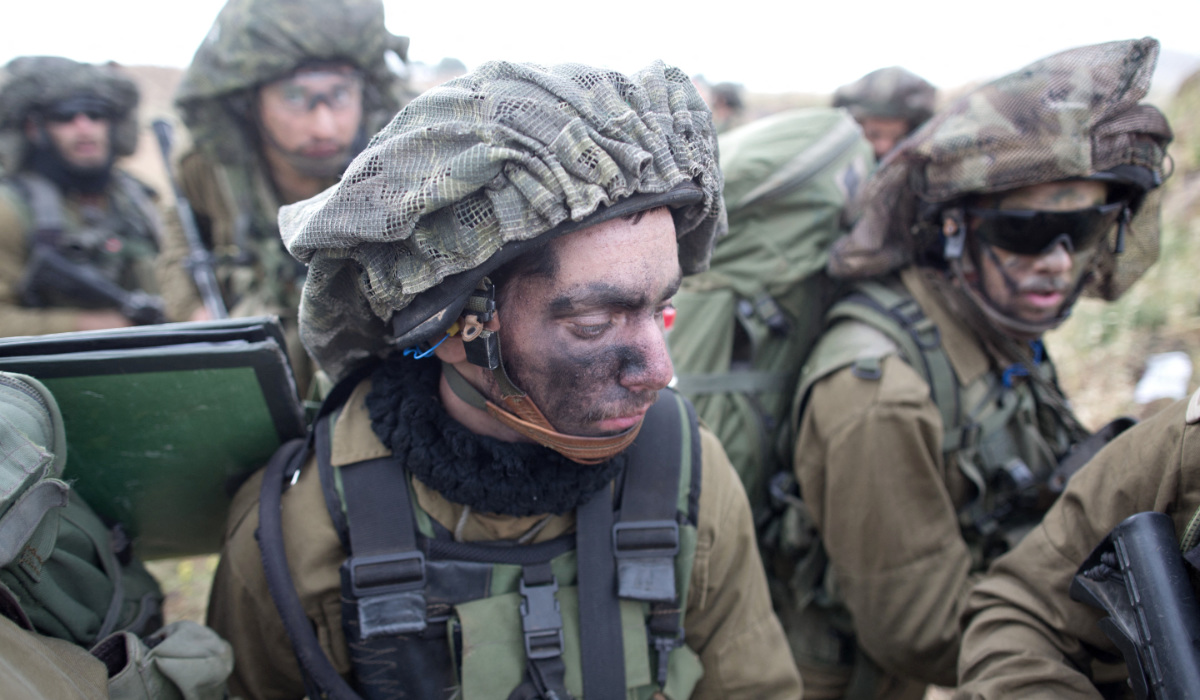 Israeli soldiers of the Jewish Ultra-Orthodox battalion "Netzah Yehuda" take part in their annual unit training in the Israeli annexed Golan Heights, near the Syrian border on May 19, 2014. (AFP)