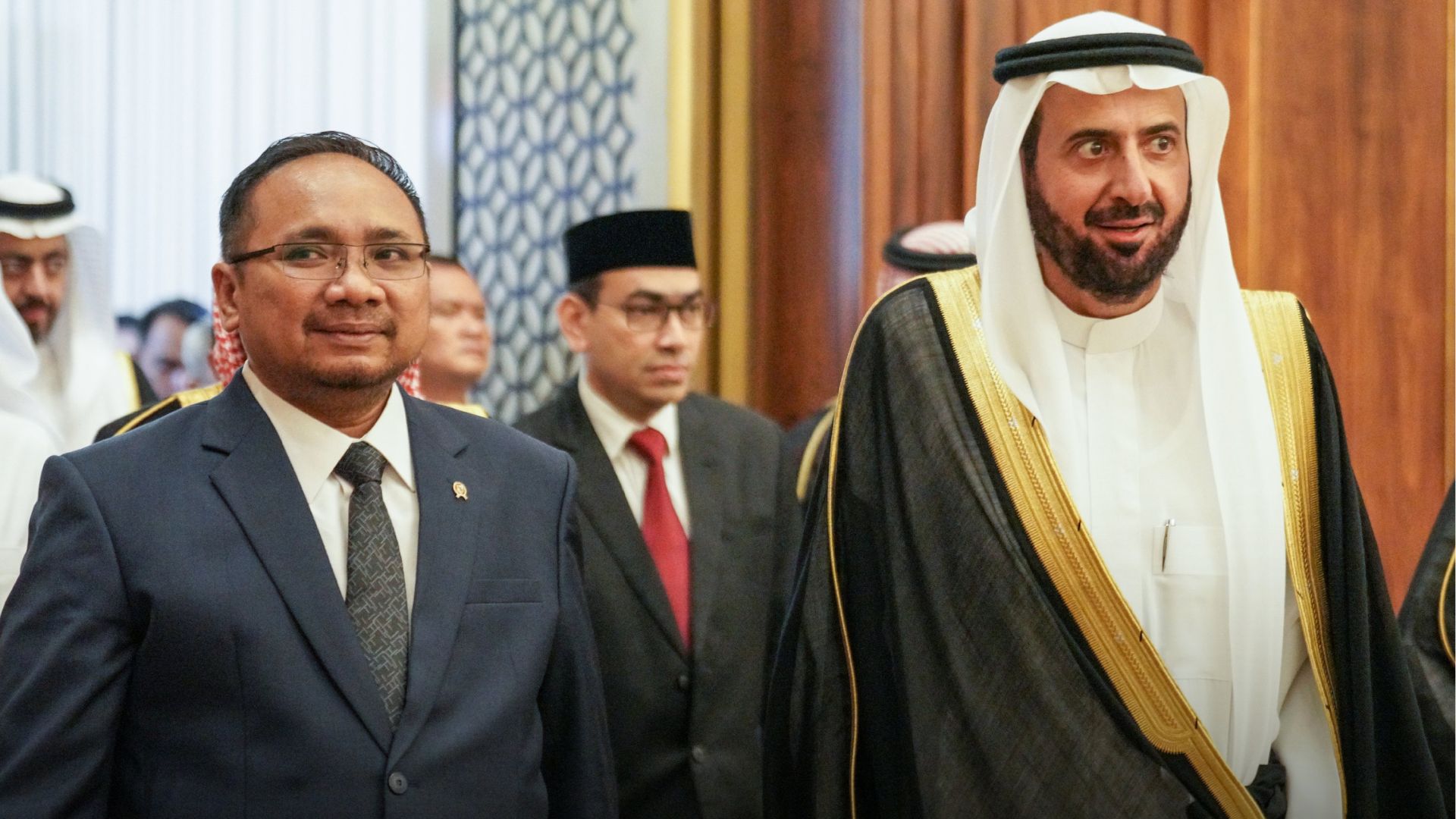 Indonesia’s Religious Affairs Minister Yaqut Cholil Qoumas and Saudi Hajj and Umrah Minister Tawfiq Al-Rabiah walks into a meeting room in Jakarta on April 30, 2024. (Saudi Ministry of Hajj and Umrah)