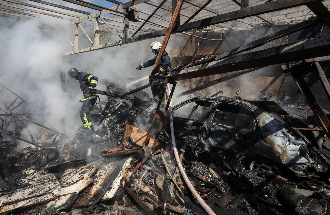 Rescuers work at a site of a Russian missile strike, amid Russia’s attack on Ukraine, in Kharkiv on Apr. 30, 2024. (Reuters)