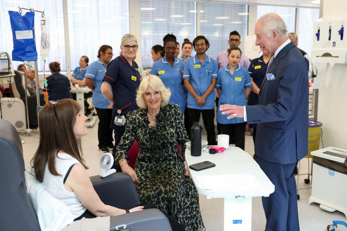 Britain’s King Charles III and Britain’s Queen Camilla meet patients during a visit to the University College Hospital Macmillan Cancer Center in London on Apr. 30, 2024. (AFP)