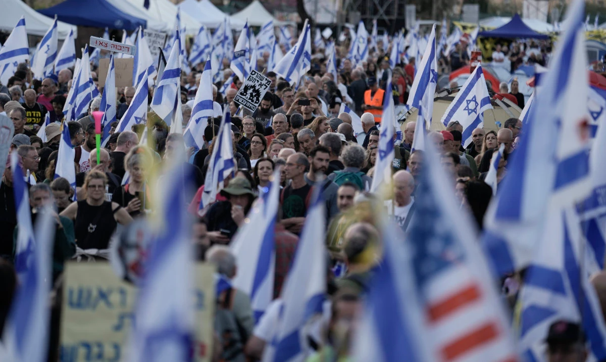 People take part in a protest against Israeli Prime Minister Benjamin Netanyahu's government and call for the release of hostages held in the Gaza Strip by the Hamas militant group outside of the Knesset, Israel's parliament, in Jerusalem, Monday, April 1, 2024. (AP)