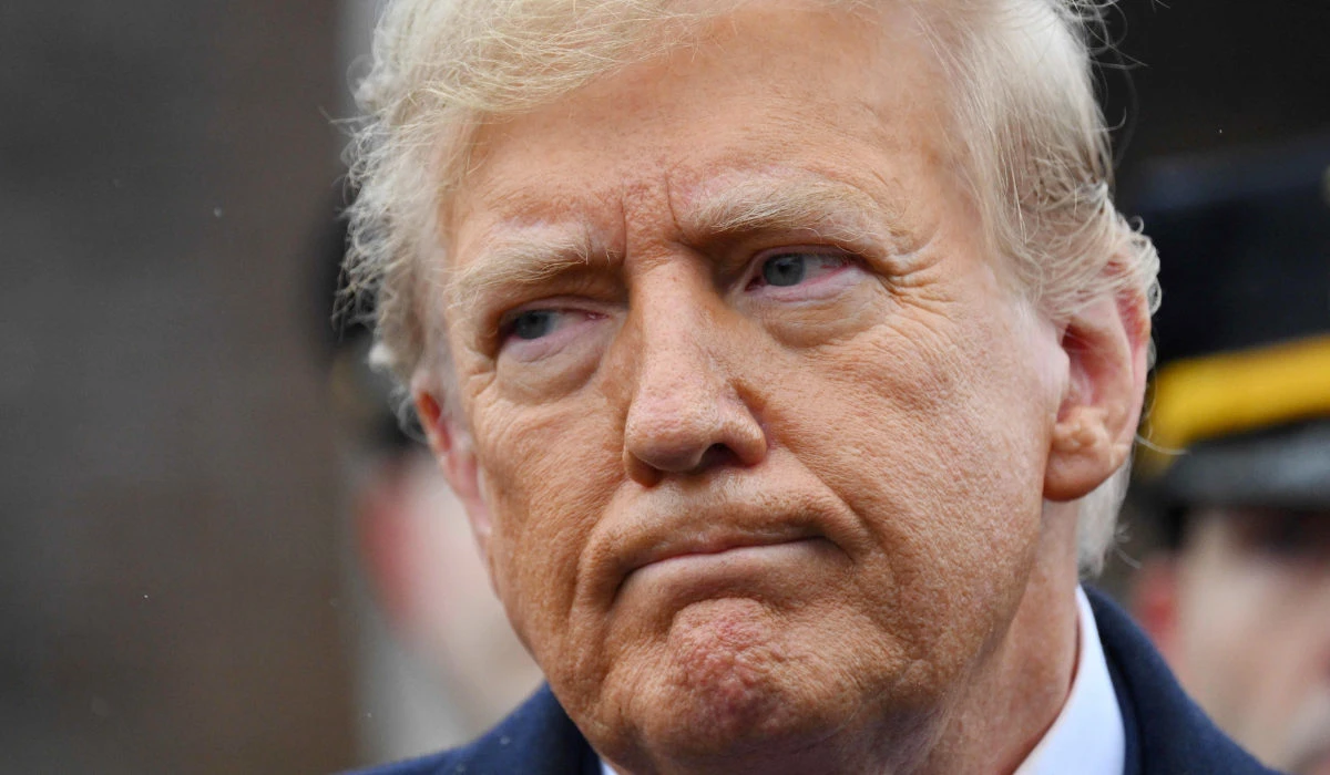 Former US President Donald Trump speaks to the press after attending the wake for New York Police Department (NYPD) Officer Jonathan Diller in Massapequa, Long Island, New York, on March 28, 2024. (AFP)