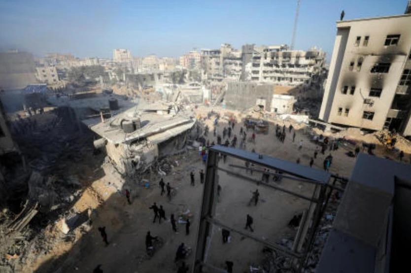 Palestinians inspect damages after Israeli forces withdrew from Gaza’s Al Shifa Hospital and the area around it following a two-week operation, amid the ongoing conflict between Israel and Hamas, in Gaza City April 1, 2024. (Reuters)