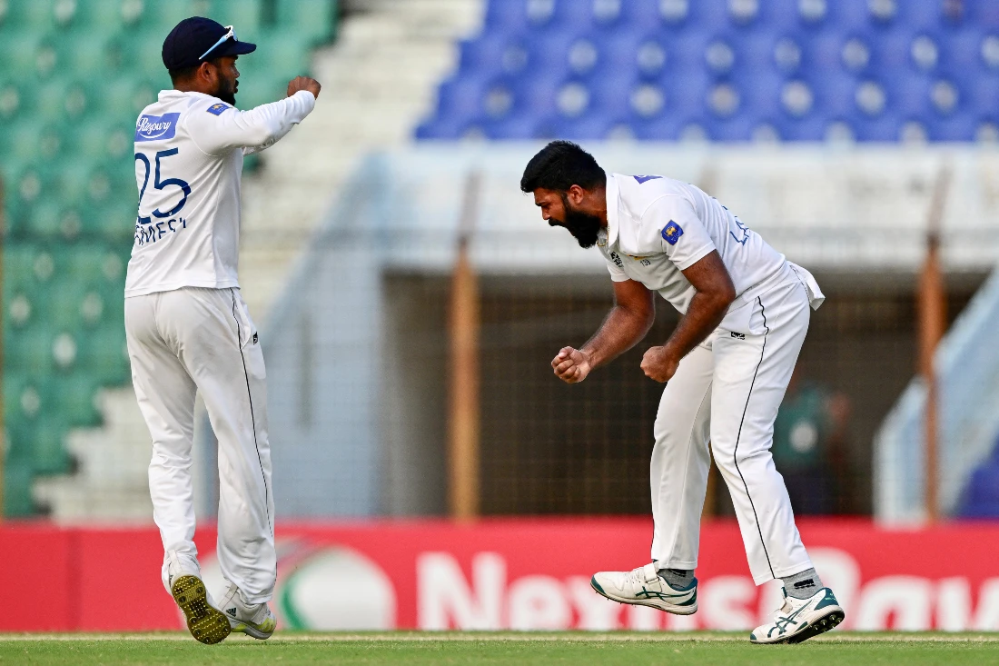 Sri Lanka’s Lahiru Kumara (R) celebrates after the dismissal of Bangladesh’s Litton Das during the fourth day of the second Test cricket match between Bangladesh and Sri Lanka at the Zahur Ahmed Chowdhury Stadium in Chittagong. (AFP)