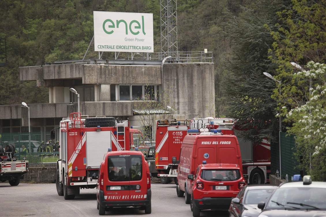 Fire engines at the site of an explosion that occurred at a hydroelectric plant on Lake Suviana, Italy, Tuesday, April 9, 2024. (AP Photo)