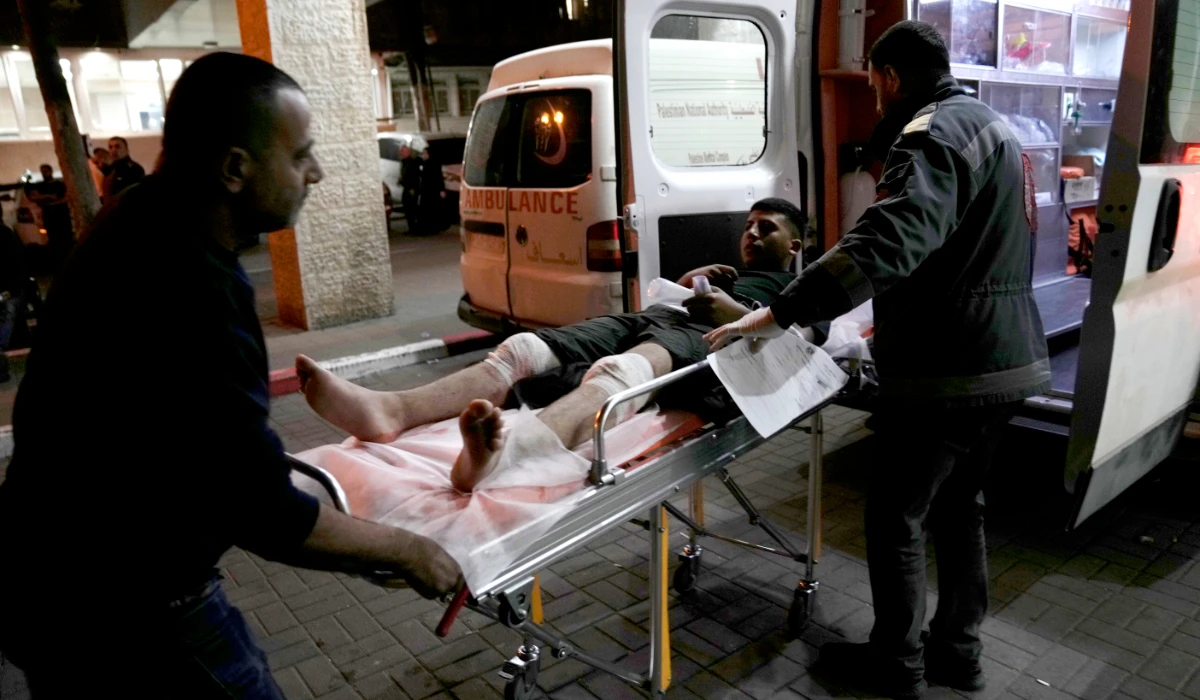 A Palestinian wounded in a settler rampage at the Palestine Medical Complex in the West Bank city of Ramallah, Friday, April 12, 2024. (AP)
