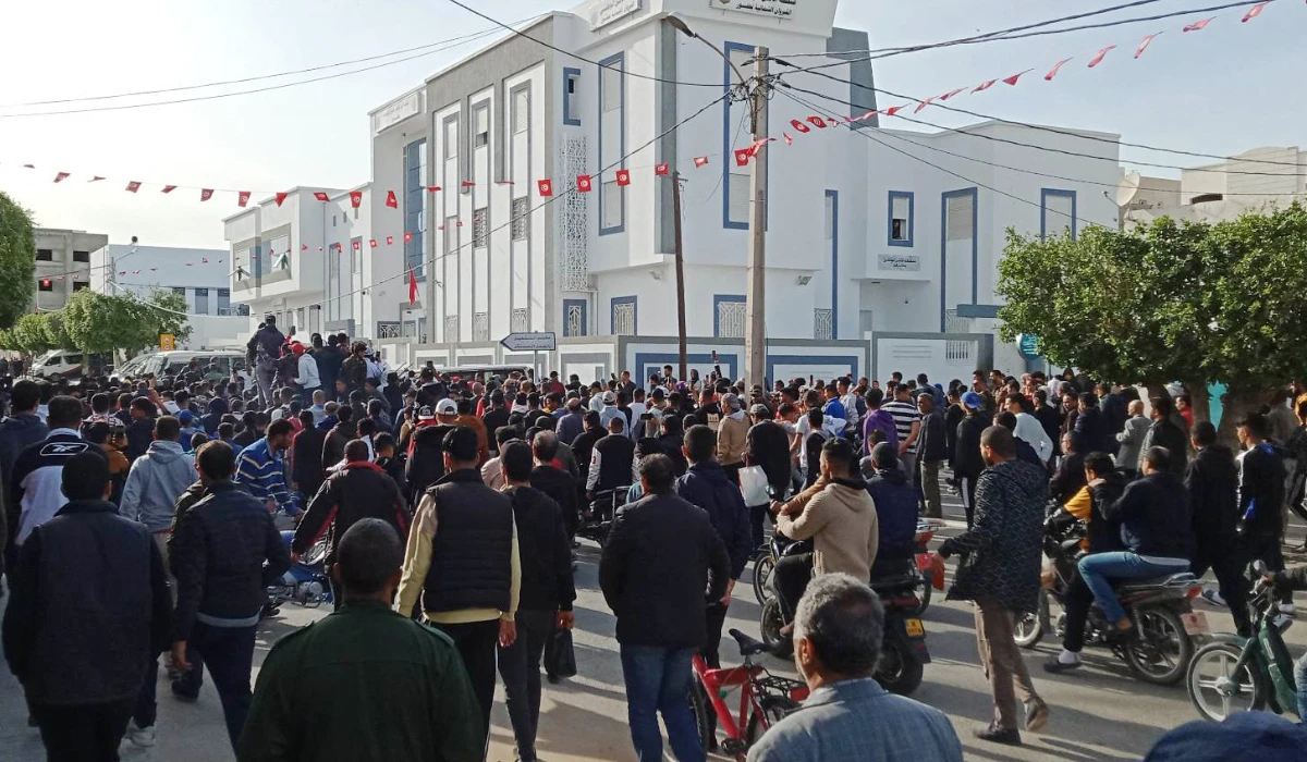 Mourners protest outside local police station in the village of Haffouz in the central Tunisian region of Kairouan on April 14, 2023, following the funeral of 35-year-old Nizar Issaoui. (AFP)