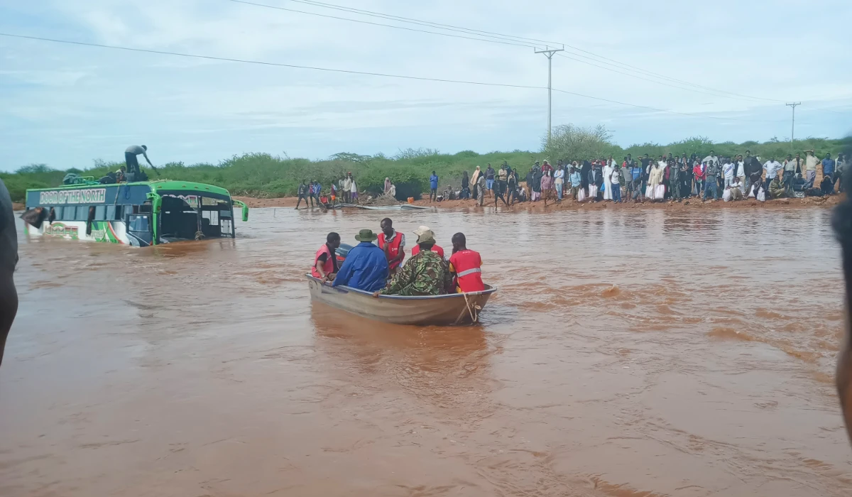 Passengers of a bus that was swept away by floodwaters are rescued by boat, near Garissa, northern Kenya, Tuesday, April 9, 2024. (AP)