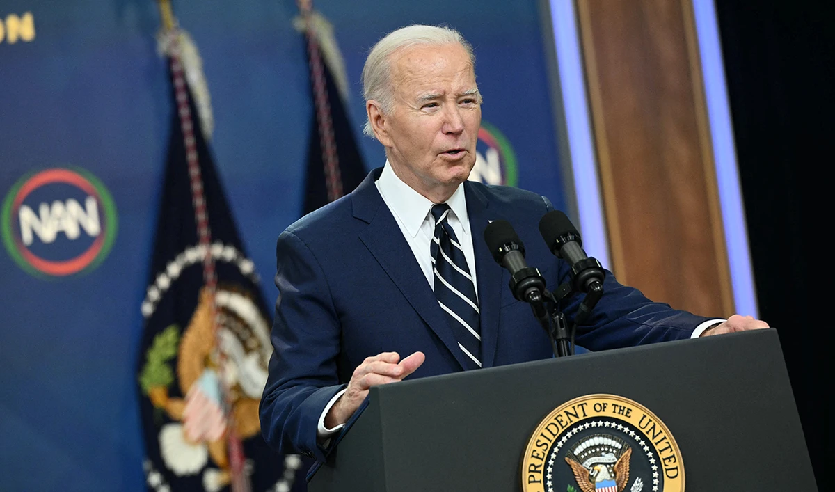 US President Joe Biden makes a virtual address to the National Action Network Convention in the South Court Auditorium of the Eisenhower Executive Office Building, next to the White House in Washington, DC on April 12, 2024. (AFP)