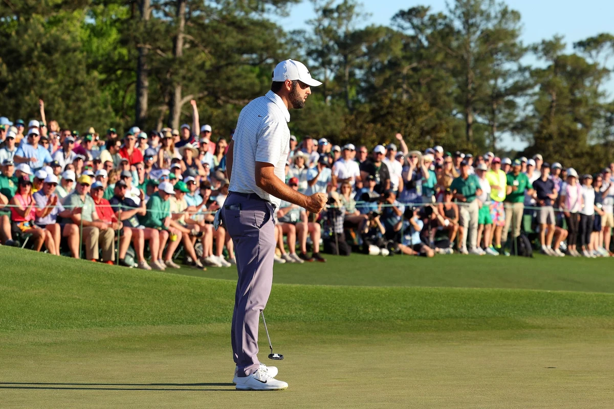 Scottie Scheffler of the US reacts after making birdie on the 18th green during the third round of the 2024 Masters golf tournament at Augusta National Golf Club on April 13, 2024 in Augusta, Georgia. (AFP)