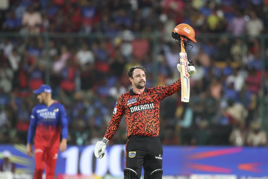 Sunrisers Hyderabad’s Travis Head celebrates scoring a century in the IPL cricket match against Royal Challengers Bangaluru, Bengaluru, India, Monday, Apr. 15, 2024. (AP Photo)