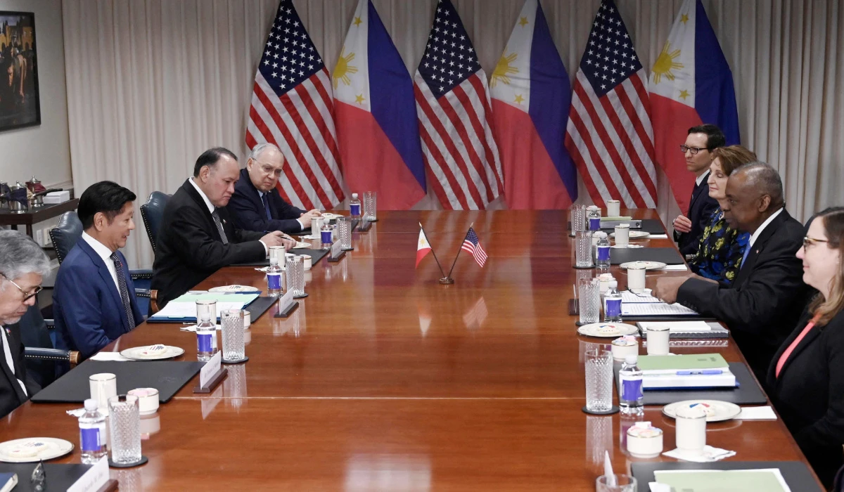 Philippines President Ferdinand Marcos Jr. (2nd L), with Foreign Secretary Enrique Manalo (L) and Defense Secretary Gilberto Teodoro (3rd L), meets with US Secretary of Defense Lloyd Austin (2nd R) at the Pentagon in Washington, DC, on April 12, 2024. (AFP)
