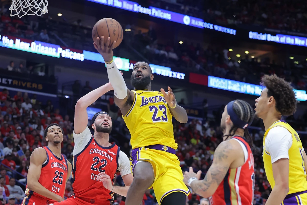 LeBron James of the Los Angeles Lakers shoots against Larry Nance Jr. #22 of the New Orleans Pelicans during the second half of a play-in tournament game at the Smoothie King Center on April 16, 2024 in New Orleans, Louisiana. (AFP)