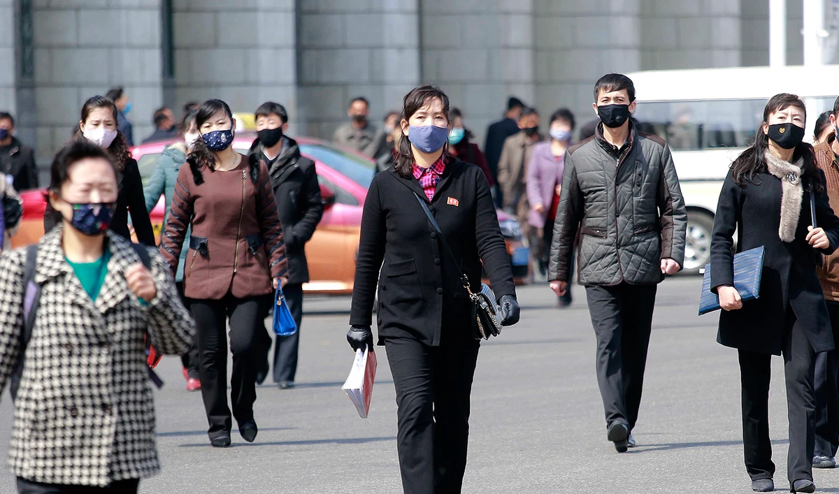 Pedestrians wear face masks to help prevent the spread of the new coronavirus in Pyongyang, North Korea, on April 1, 2020. (AP/File)