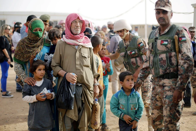 Syrian refugees stranded at the Rukban camp in southeast Syria near the Iraqi and Jordanian border. (Reuters)