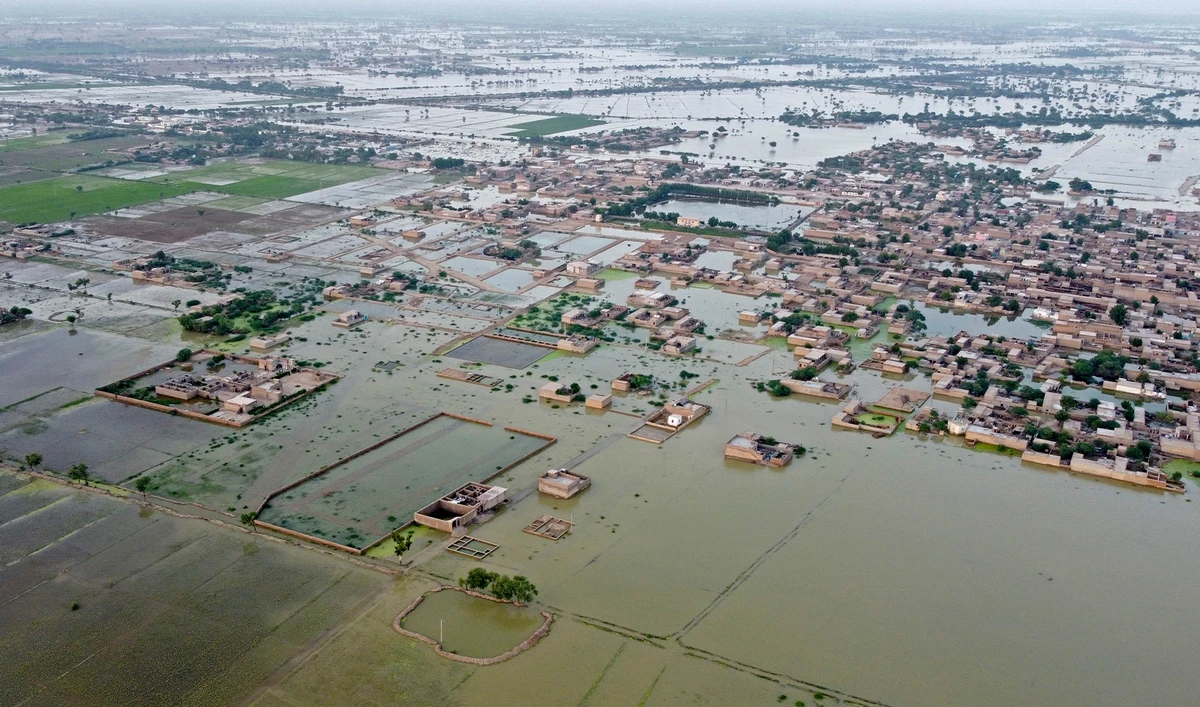 This aerial photograph taken on September 5, 2022 shows flooded residential areas after heavy monsoon rains in Dera Allah Yar, Balochistan province. (AFP)