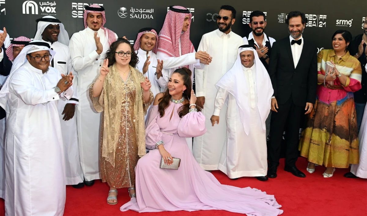 Walaa Bahefzallah (R), casting director of Saudi film Champions, alongside the cast at the 2021 Red Sea Film Festival, including Fatima Albanawi (C). (Supplied)