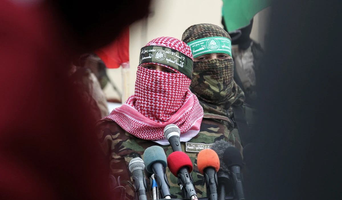 Abu Ubaida (C) spokesman of the Ezzedine Al-Qassam Brigades, the military wing of the Palestinian movement Hamas, speaks during a memorial in the southern Gaza Strip town of Rafah on January 31, 2017. (AFP file photo)