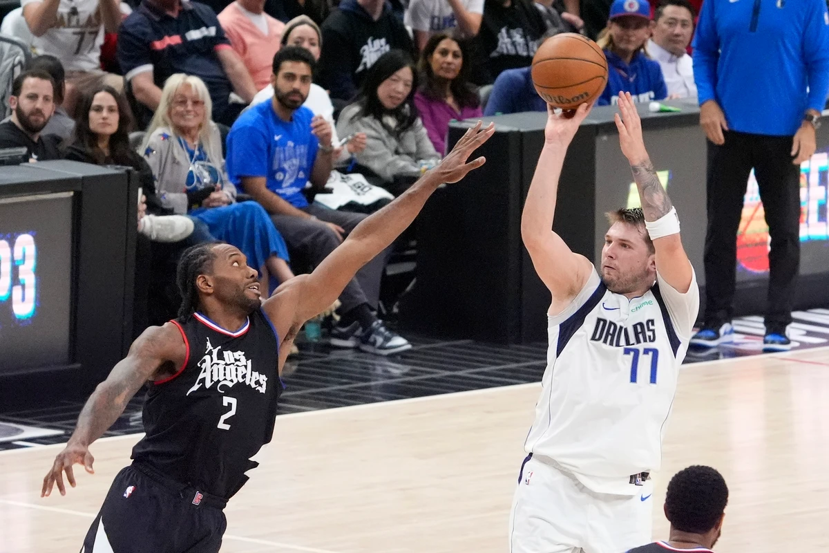 Dallas Mavericks guard Luka Doncic, right, shoots as Los Angeles Clippers forward Kawhi Leonard defends during the second half in Game 2 of an NBA basketball first-round playoff series Tuesday in Los Angeles. (AP)