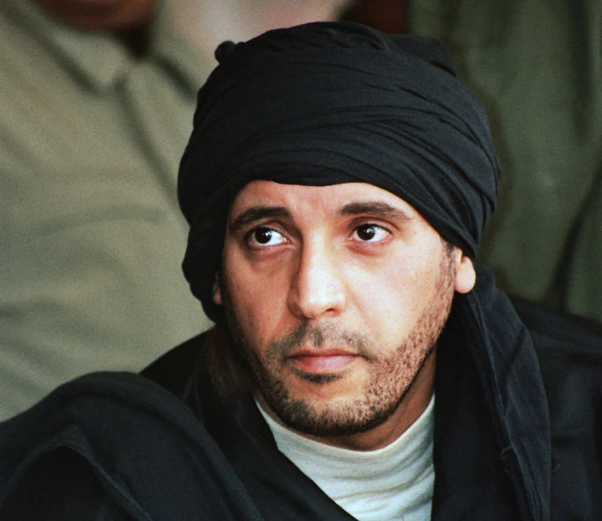 Hannibal Qaddafi, son of ousted Libyan leader Muammar Qaddafi, watches an elite military unit exercise in Zlitan, Libya, Sept. 25, 2011. (AP Photo)