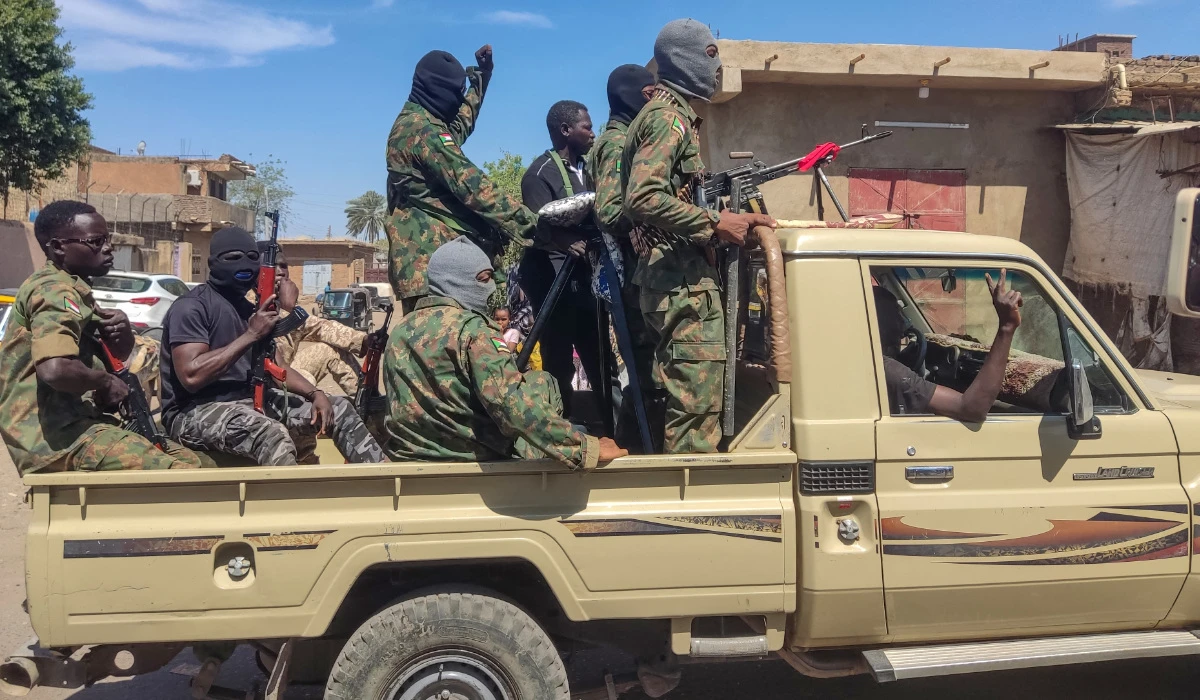 Supporters of the Sudanese armed popular resistance, which backs Sudan's army, ride on trucks in Gedaref in eastern Sudan on March 3, 2024, amid the ongoing conflict in the country between the army and paramilitaries. (AFP)