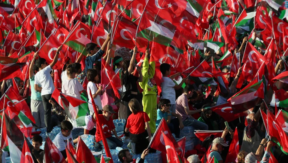 People attend a rally in Istanbul in solidarity with Palestinians in Gaza. (Reuters/File Photo)