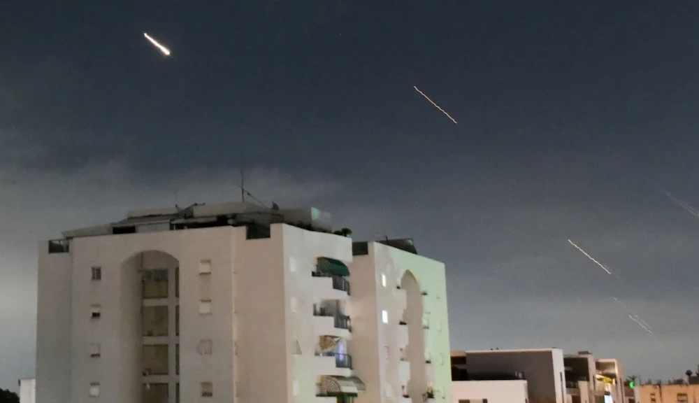 Israel's Iron Dome air defense system intercepts missiles fired from Iran. (AP)
