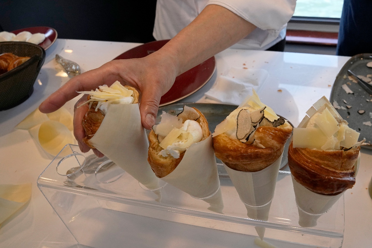 Twisted croissants with artichoke puree, a poached egg, a bit of truffle, and a bit of cheese, created by French chef Amandine Chaignot, are seen Tuesday in Paris. (AP)