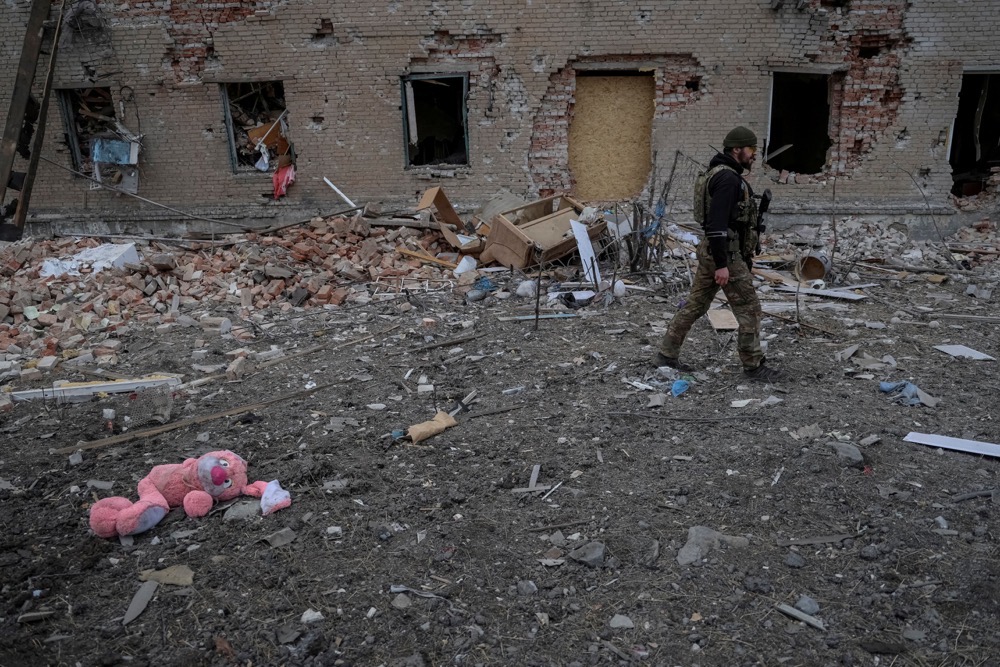 A Ukrainian serviceman walks near destroyed building, amid Russia's attack on Ukraine, in the frontline town of Chasiv Yar in Donetsk region. (Reuters/FIle)