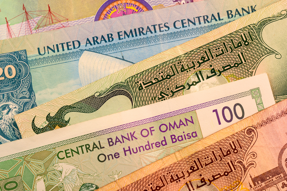 Most currencies in the region are pegged to the US dollar. Shutterstock