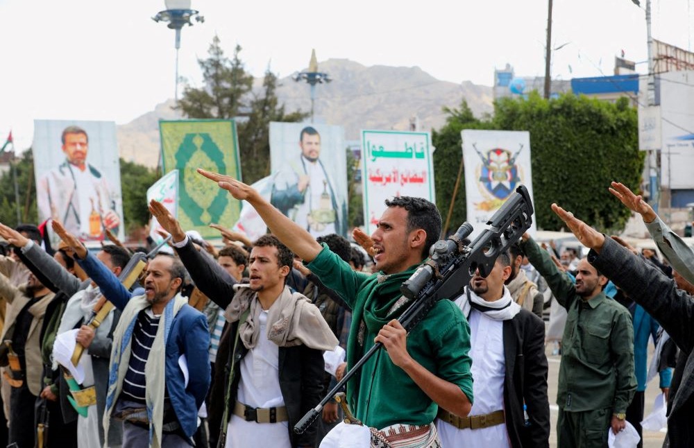 Participants take the oath of allegiance to the Houthi movement during a parade in Sanaa, Yemen, Feb. 8, 2024. (Reuters)