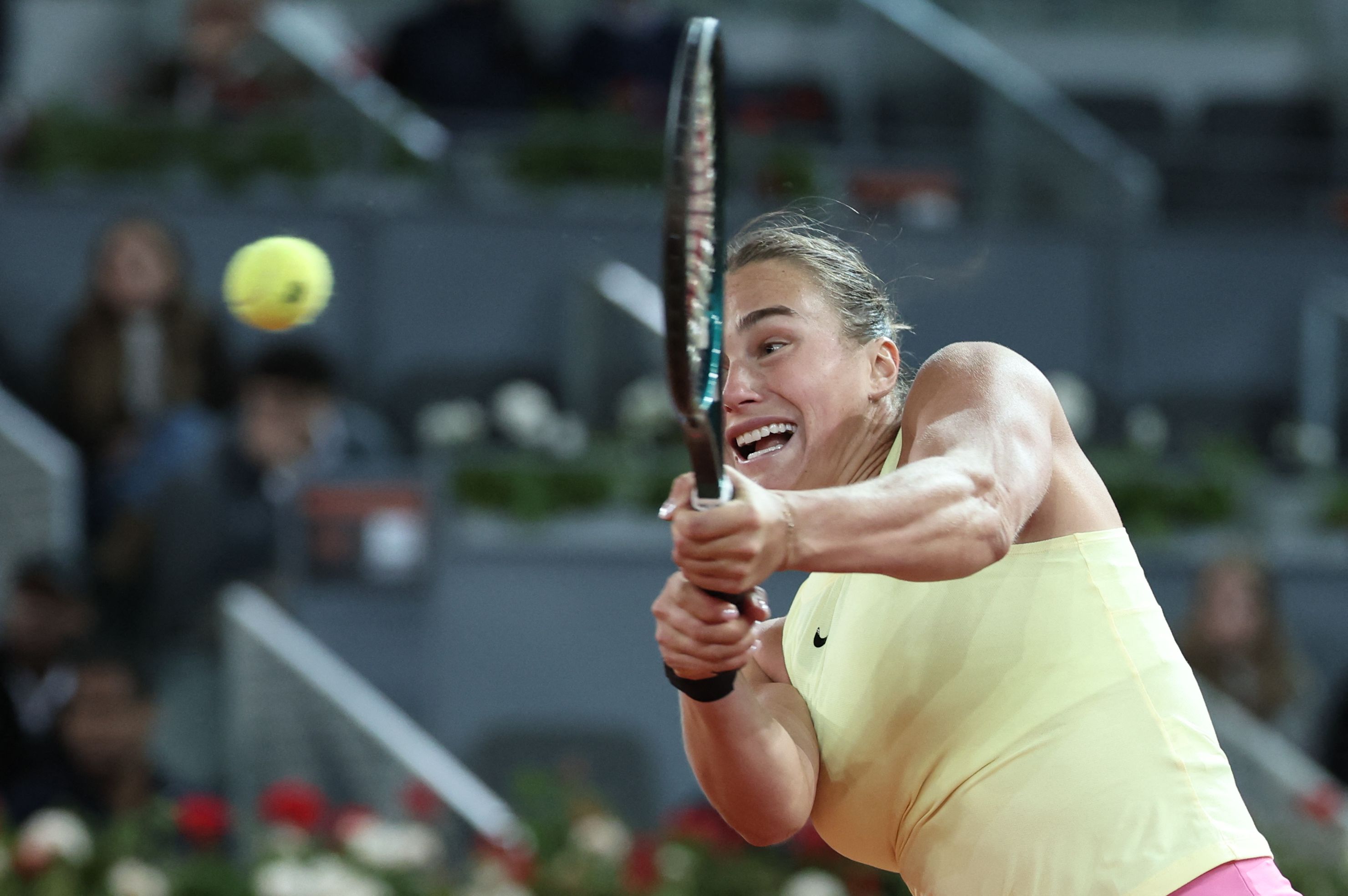 Belarus' Aryna Sabalenka returns the ball against Kazakhstan's Elena Rybakina during the 2024 WTA Tour Madrid Open tournament semifinal tennis match at Caja Magica in Madrid on May 2, 2024. (AFP)