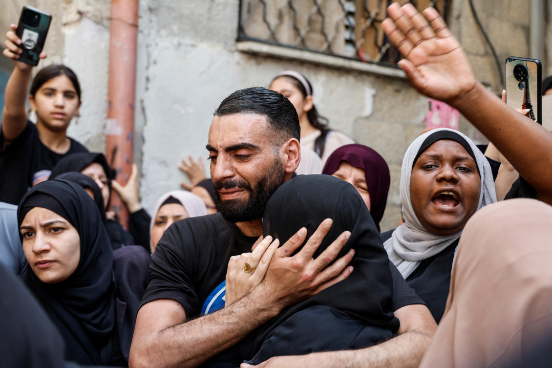 Mourners react during the funeral of Palestinian militant, Ahmed Abu al-Foul, who was killed by Palestinian Authority forces in Tulkarm camp, in the Israeli-occupied West Bank. (File/Reuters)