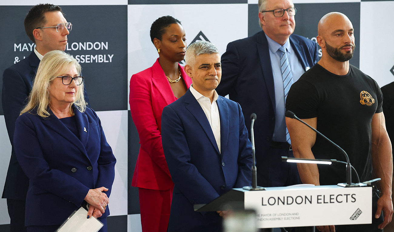 Liberal Democrat candidate Rob Blackie, Independent candidate Natalie Campbell, Conservatives candidate Susan Hall, Mayor of London and Labour Party candidate Sadiq Khan, Reform UK candidate Howard Cox, Independent candidate Andreas Christoffi Michli react on the day of the results of the London mayoral election, at City Hall in London, Britain May 4, 2024. (REUTERS)