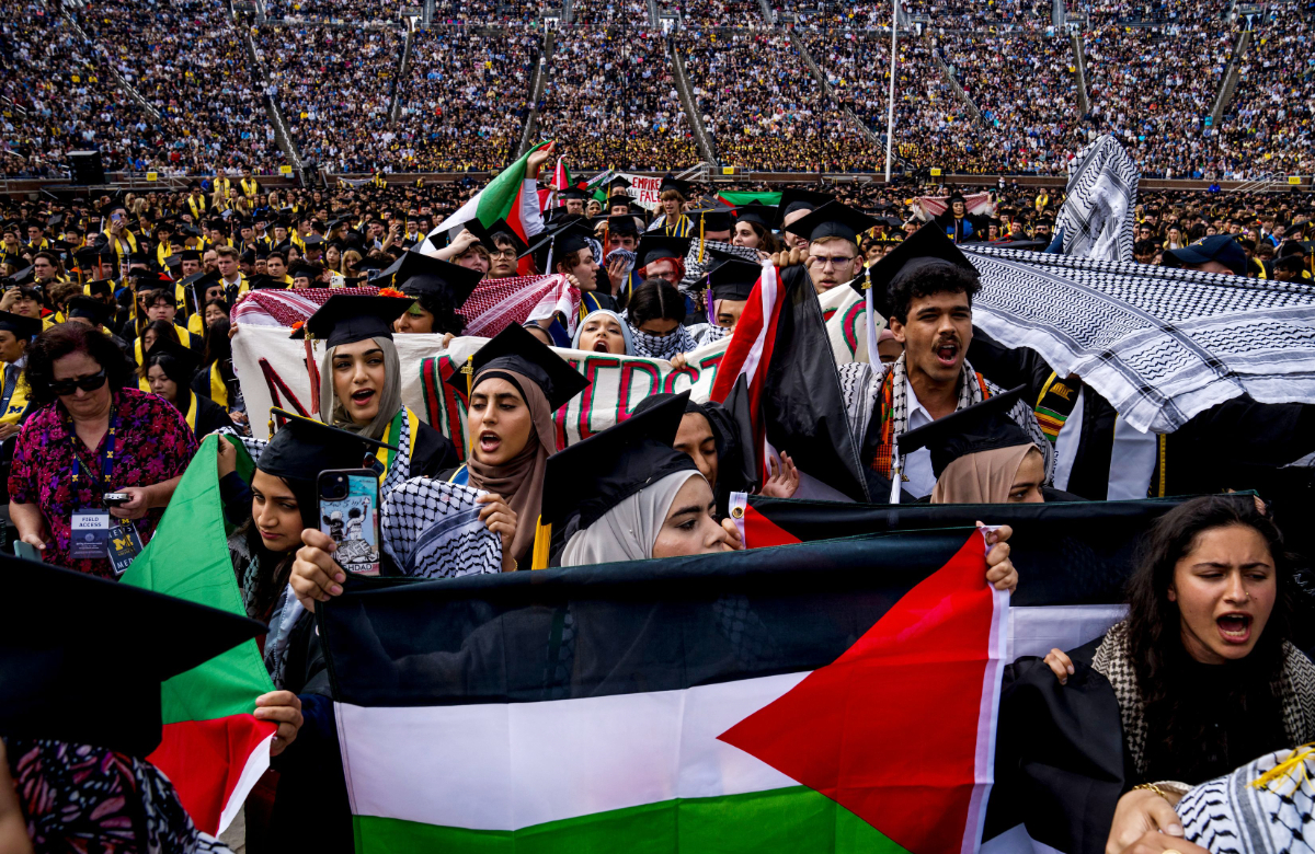 Students demonstate during a Pro-Palestinian protest during the University of Michigan's spring commencement ceremony on May 4, 2024 at Michigan Stadium in Ann Arbor, Michigan. (AFP)