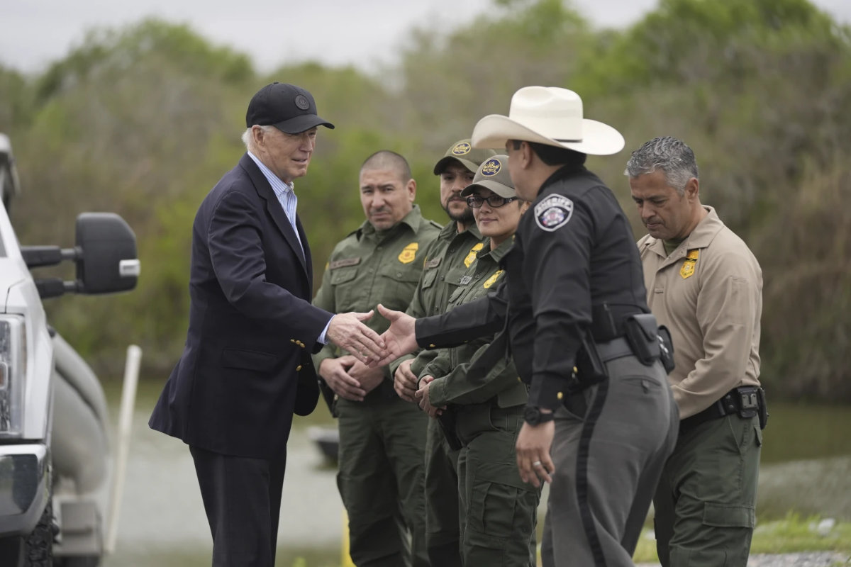 President Joe Biden talks with the US Border Patrol and local officials, as he looks over the southern border, on Feb. 29, 2024, in Brownsville, Texas, along the Rio Grande. (AP)