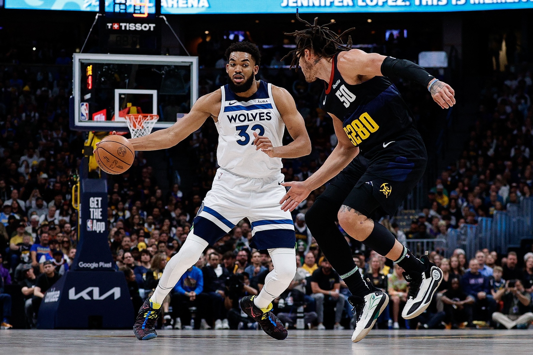 Minnesota Timberwolves center Karl-Anthony Towns (32) up against Denver Nuggets forward Aaron Gordon in the first quarter during Game 2 of the second round for the 2024 NBA playoffs at Ball Arena. (USA TODAY Sports)