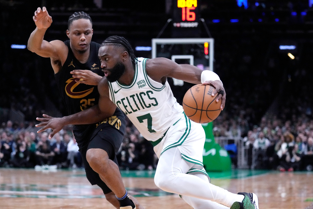 Boston Celtics guard Jaylen Brown drives to the basket against Cleveland Cavaliers forward Isaac Okoro during the second half of Game 1 of an NBA basketball second round playoff series in Boston. (AP)