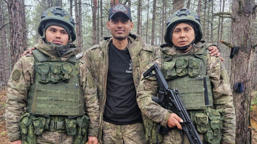 Hemil Mangukiya, center, was killed on the front line of the Russo-Ukrainian War. (Reuters)